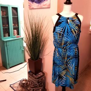 Bright dress that can be worn in casual fashion or for Happy hour with heels.